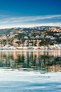 Preview wallpaper mountains, buildings, houses, yachts, pier, water
