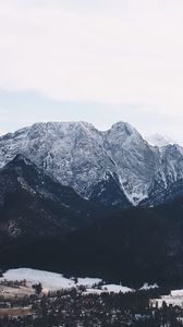 Preview wallpaper mountains, buildings, sky, peaks, snow