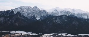 Preview wallpaper mountains, buildings, sky, peaks, snow