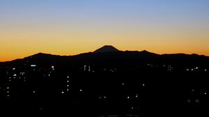 Preview wallpaper mountains, buildings, sunrise, dark