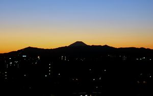 Preview wallpaper mountains, buildings, sunrise, dark