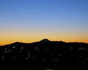 Preview wallpaper mountains, buildings, sunrise, dark