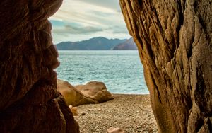 Preview wallpaper mountains, cave, beach, sea