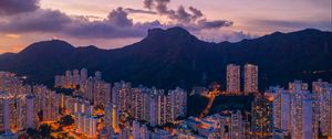 Preview wallpaper mountains, city, buildings, lights, apartments
