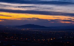 Preview wallpaper mountains, city, lights, night
