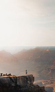Preview wallpaper mountains, cliff, man, rock, height
