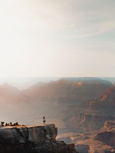 Preview wallpaper mountains, cliff, man, rock, height