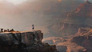 Preview wallpaper mountains, cliff, man, rock, height