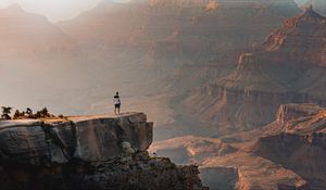 Preview wallpaper mountains, cliff, man, rock, height