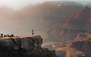 Preview wallpaper mountains, cliff, man, rock, height