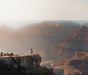 Preview wallpaper mountains, cliff, man, rock, height