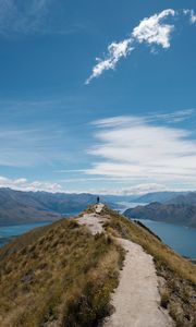 Preview wallpaper mountains, cliff, silhouette, lake, distance