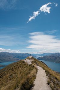 Preview wallpaper mountains, cliff, silhouette, lake, distance