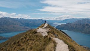 Preview wallpaper mountains, cliff, silhouette, lake, distance