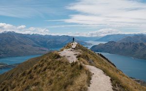 Preview wallpaper mountains, cliff, silhouette, lake, distance