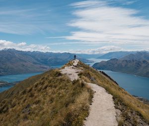 Preview wallpaper mountains, cliff, silhouette, lake, distance