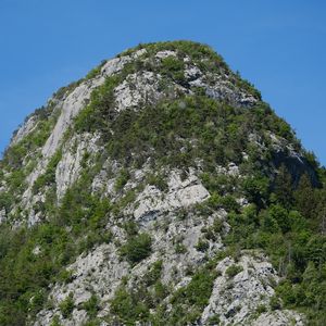 Preview wallpaper mountains, cliff, trees, nature, forest, slope, landscape