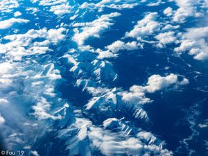 Preview wallpaper mountains, clouds, aerial view, height, view, overview