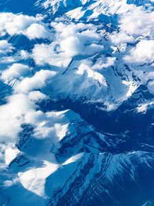 Preview wallpaper mountains, clouds, aerial view, peaks, snowy