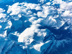 Preview wallpaper mountains, clouds, aerial view, peaks, snowy