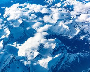 Preview wallpaper mountains, clouds, aerial view, peaks, snowy
