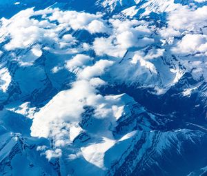 Preview wallpaper mountains, clouds, aerial view, peaks, snowy