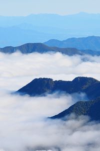 Preview wallpaper mountains, clouds, aerial view, mountain range, peaks