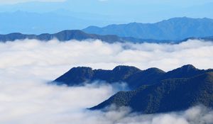 Preview wallpaper mountains, clouds, aerial view, mountain range, peaks