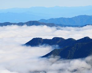 Preview wallpaper mountains, clouds, aerial view, mountain range, peaks