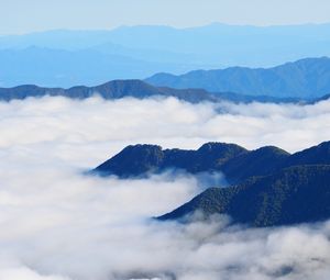 Preview wallpaper mountains, clouds, aerial view, mountain range, peaks
