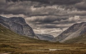 Preview wallpaper mountains, clouds, cloudy, grass