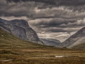 Preview wallpaper mountains, clouds, cloudy, grass