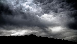 Preview wallpaper mountains, clouds, dark, dusk, storm