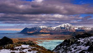 Preview wallpaper mountains, clouds, lake, height, sea, coast, snow, spring, sky