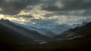 Preview wallpaper mountains, clouds, light, rays, twilight, landscape