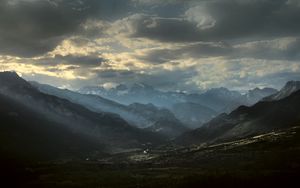 Preview wallpaper mountains, clouds, light, rays, twilight, landscape