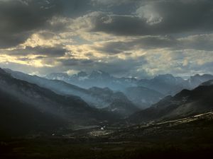 Preview wallpaper mountains, clouds, light, rays, twilight, landscape