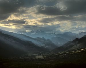 Preview wallpaper mountains, clouds, light, rays, twilight, landscape