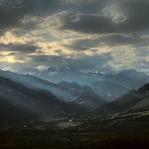Preview wallpaper mountains, clouds, light, rays, twilight, landscape