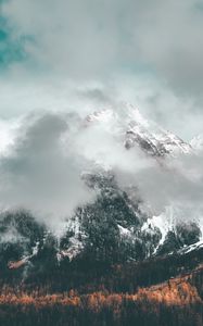 Preview wallpaper mountains, clouds, peak, forest, slope, snowy