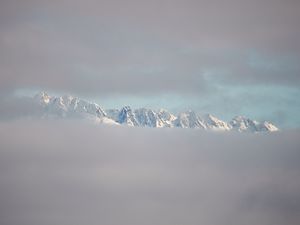 Preview wallpaper mountains, clouds, peaks, snowy, snow