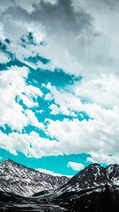 Preview wallpaper mountains, clouds, sky, snowy, porous