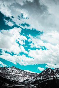 Preview wallpaper mountains, clouds, sky, snowy, porous
