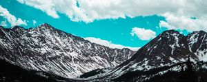 Preview wallpaper mountains, clouds, sky, snowy, porous