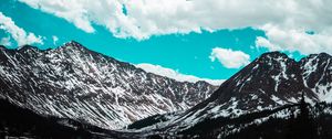 Preview wallpaper mountains, clouds, sky, snowy, porous