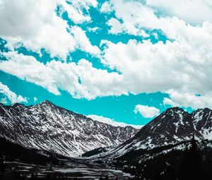 Preview wallpaper mountains, clouds, sky, snowy, porous