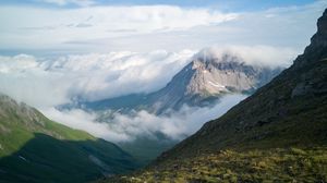 Preview wallpaper mountains, clouds, slope, grass, nature