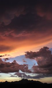 Preview wallpaper mountains, clouds, sunset, sky, cloudy
