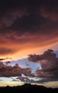 Preview wallpaper mountains, clouds, sunset, sky, cloudy