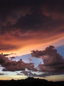 Preview wallpaper mountains, clouds, sunset, sky, cloudy